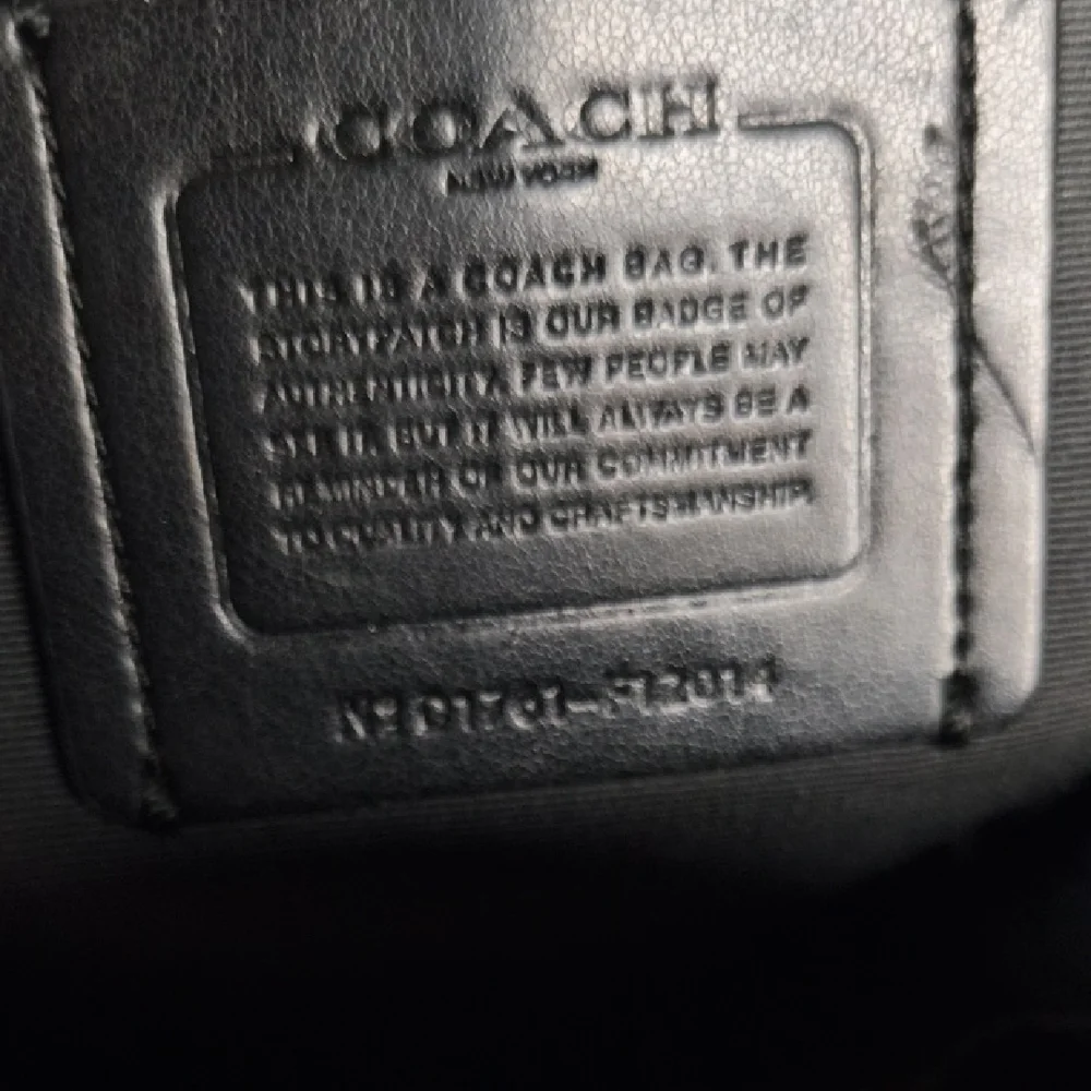Coach Black and Purple Backpack with Pebbled Texture F12014